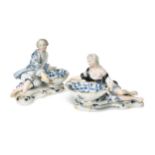 A pair of Meissen blue and white figural sweetmeats, early 20th century,