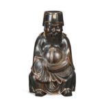 A Chinese carved zitan-type wood and parcel gilt seated figure of an official, 20th century,