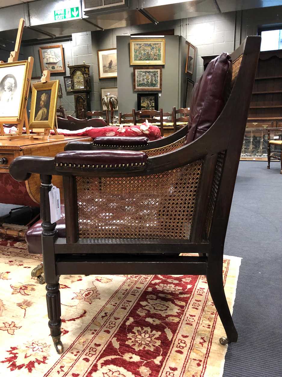 A caned mahogany bergère library armchair, 19th century, - Image 7 of 7