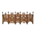 A Gothic style carved giltwood panel, probably Italian 19th century,