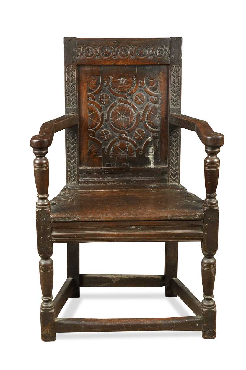 A joined oak caqueteuse type open armchair, 17th century,