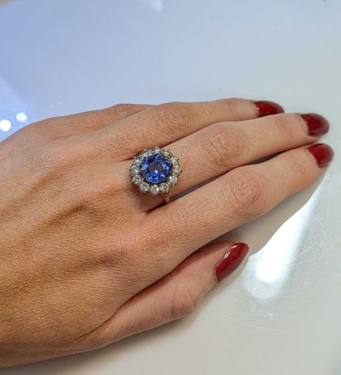 A sapphire and diamond cluster ring, - Image 5 of 6