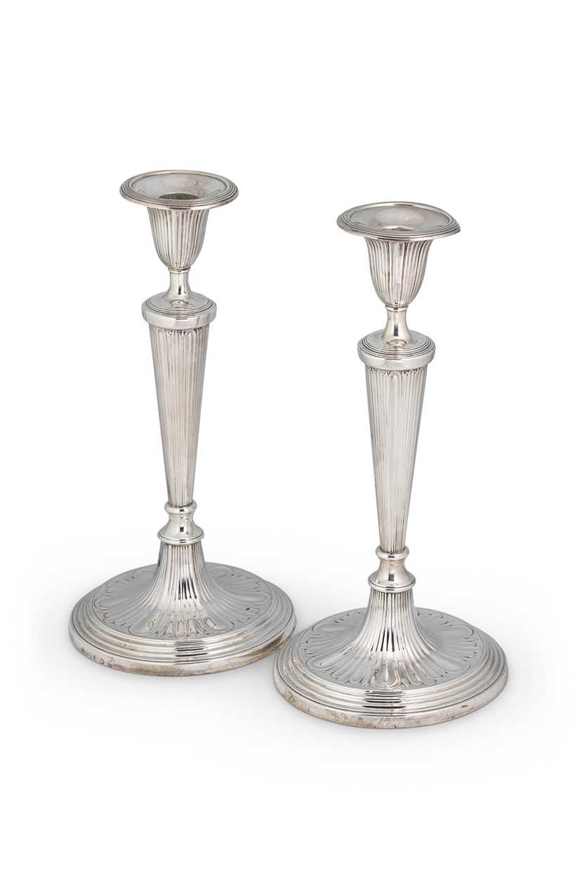 A pair of George III 18th century silver candlesticks,