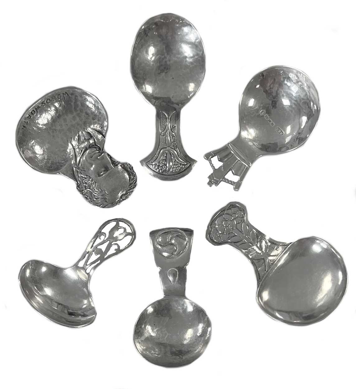 A collection of six silver 'Arts & Crafts' and later caddy spoons,