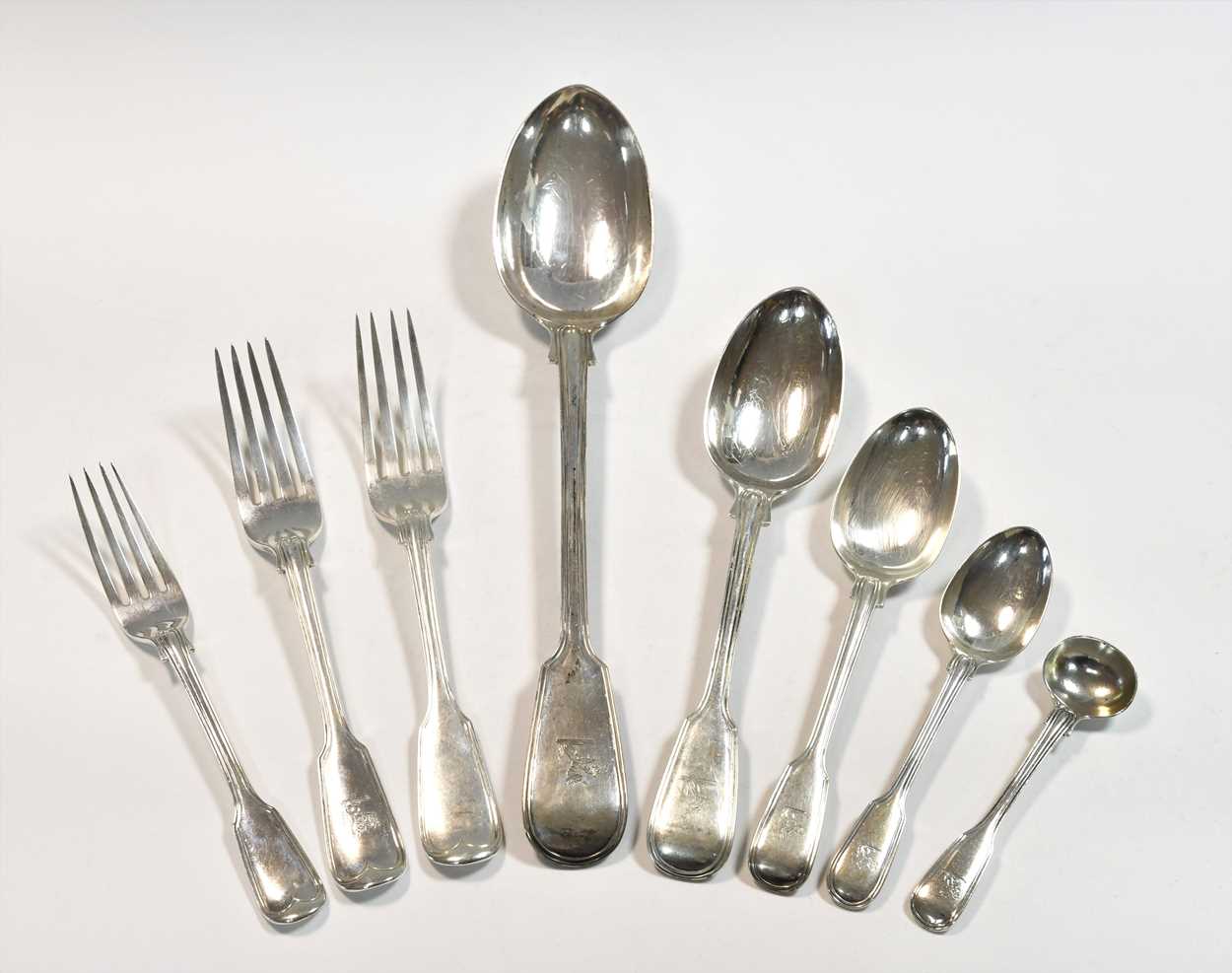 A 33-piece set of Victorian silver flatware, mark of Hunt & Roskell with 23 additions,