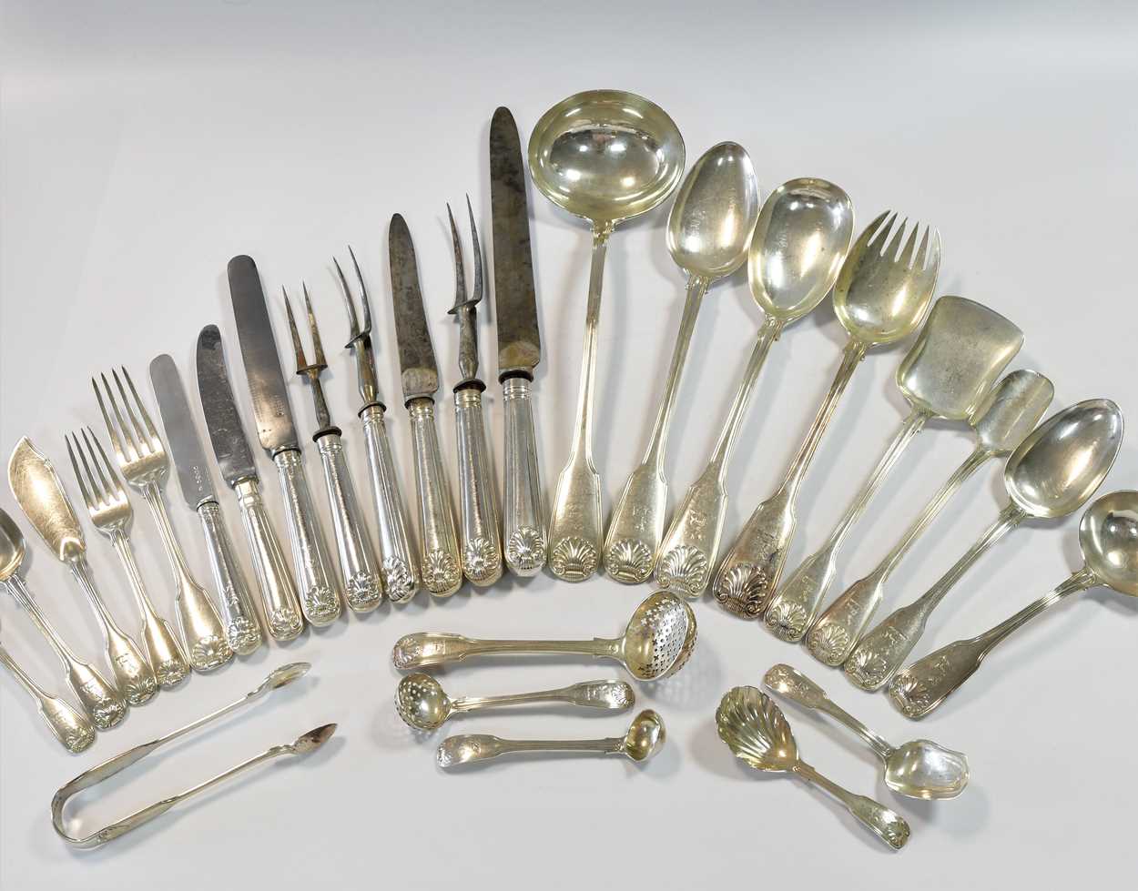 A 64-piece set of George IV silver flatware with 89 additions,