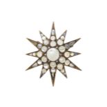 A Victorian moonstone star brooch,