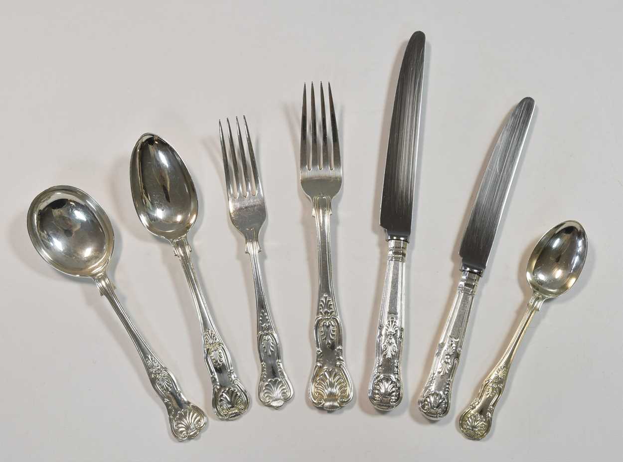 An 84-piece harlequin set of Victorian and later silver cutlery and flatware with 2 additions,