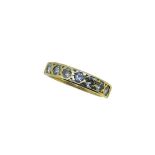 An 18ct gold seven stone diamond ring,