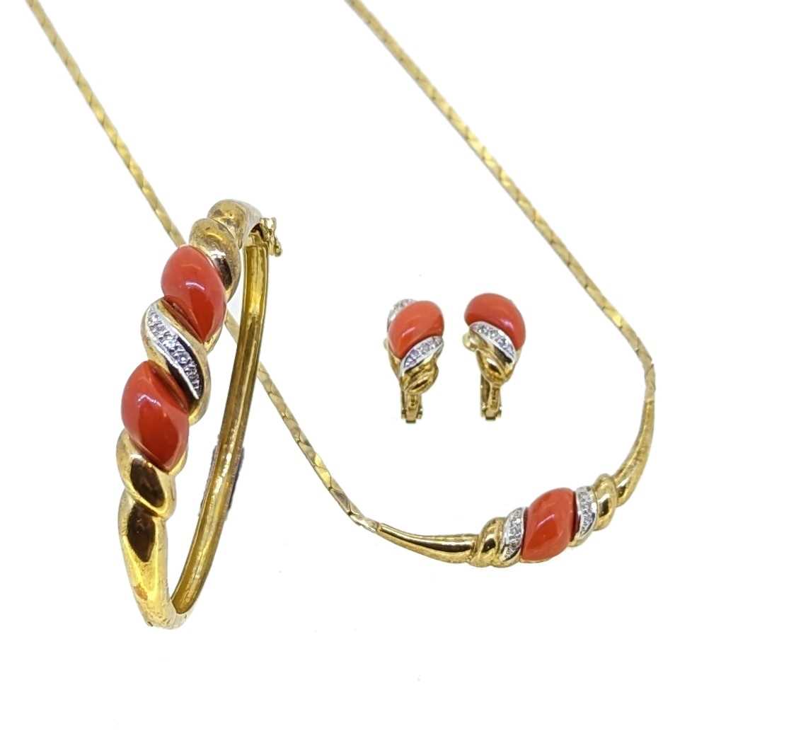 A late 20th century suite of coral jewellery,