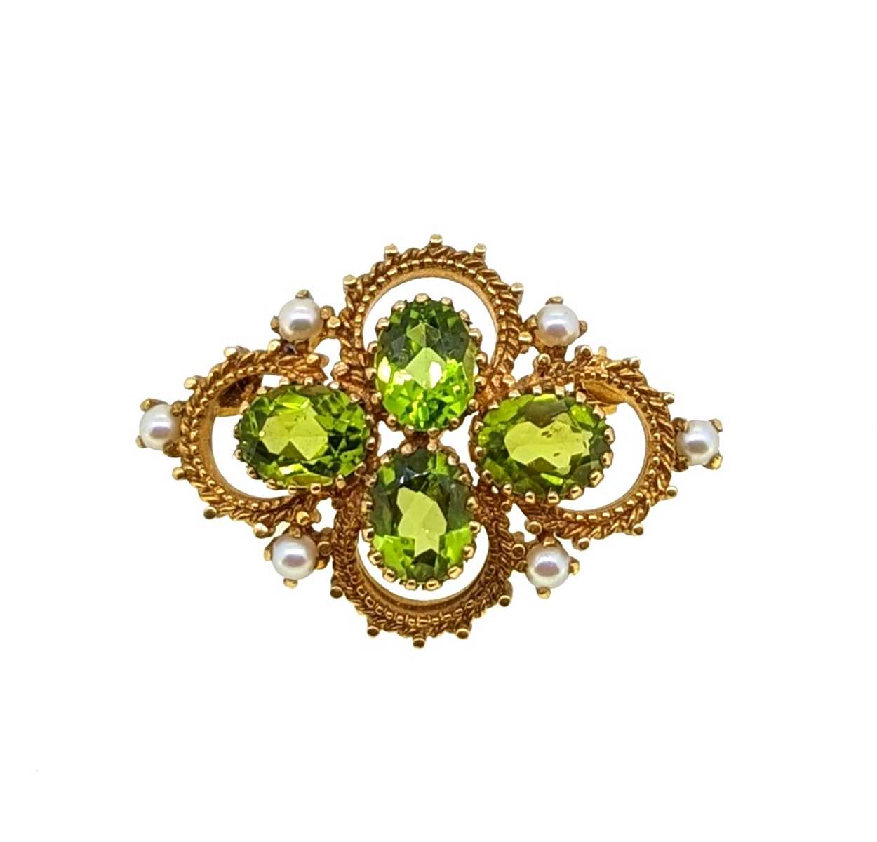 A late 20th century peridot and pearl brooch,