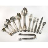 A 53-piece set of Victorian silver flatware with 34 additions,