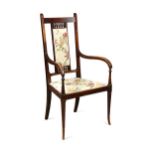 George Walton (1867-1933), a stained mahogany armchair, circa 1900,