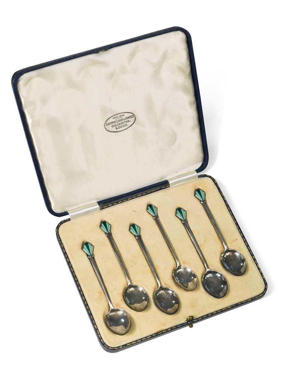 A cased set of six silver and enamel teaspoons by William Hair Haseler,