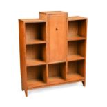 Attributed to Heal's, a limed oak stepped bookcase, circa 1930,