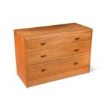 A Cotswold School maple low chest of drawers,