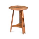 An Arts & Crafts oak occasional table,