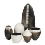 Jane Hollidge (Contemporary), a collection of six smoke fired vessels,