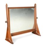 A Cotswold School walnut swing mirror,
