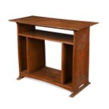 In the manner of Alfred Wickham Jarvis, an Arts & Crafts oak side table,