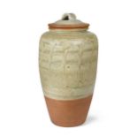 § Mike Dodd (born 1943) a large cut-sided stoneware jar and cover,