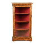 A Victorian burr walnut glass fronted bookcase with gilt metal mounts,