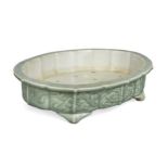 An oriental celadon glazed shallow jardiniere, late Qing Dynasty, late 19th/early 20th century,