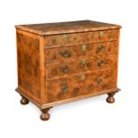 A William & Mary and later oyster veneered walnut chest of drawers,