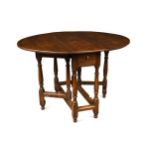 An oak gateleg table, 18th century,
