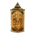 A George III style yellow painted chinoiserie corner cupboard,