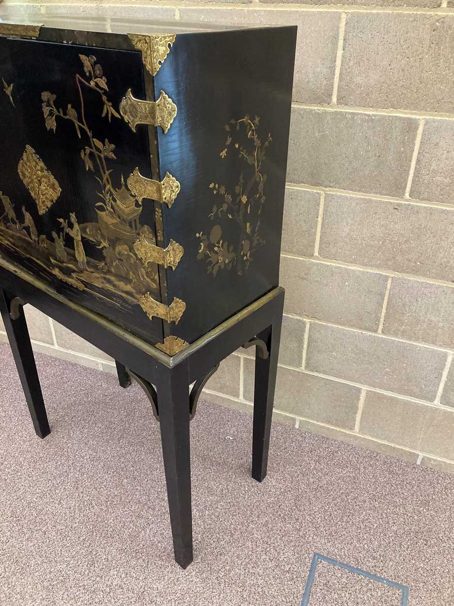 A Chinese black lacquer cabinet on later stand, 19th century, - Image 24 of 42