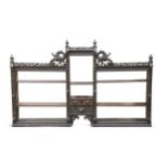 A carved oak set of open shelves, 19th century,