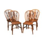 A set of four fruitwood Windsor chairs, 19th century,