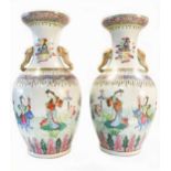 A pair of Chinese export polychrome vases, Qing Dynasty, late 19th century,