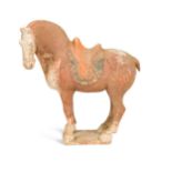 A Chinese red-painted pottery figure of a standing horse, Tang Dynasty (AD 618-907),