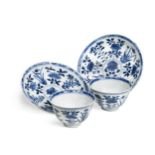 A pair of Chinese blue and white tea bowls and saucers, Kangxi Period (1662-1722),