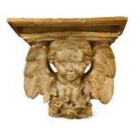 A carved giltwood wall bracket, 18th century,