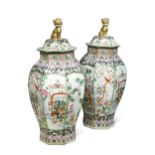 A large pair of Chinese porcelain famille rose octagonal vases and covers, Yongzheng-style,