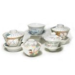 A pair of Chinese porcelain rice bowls, covers and stands, late Qing Dynasty/early Republic,