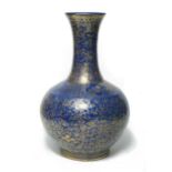 A Chinese blue monochrome and gilt bottle vase, Qing Dynasty, 19th century,