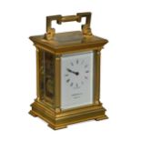 A modern gilt brass carriage clock marked Garrard & Co,