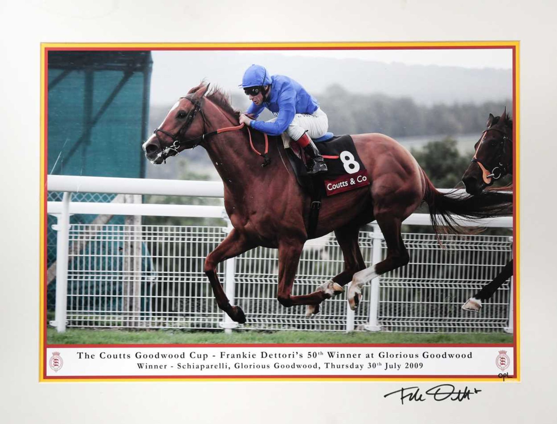 A Coutts Goodwood Cup signed photograph of Frankie Dettori riding Schiaparelli,