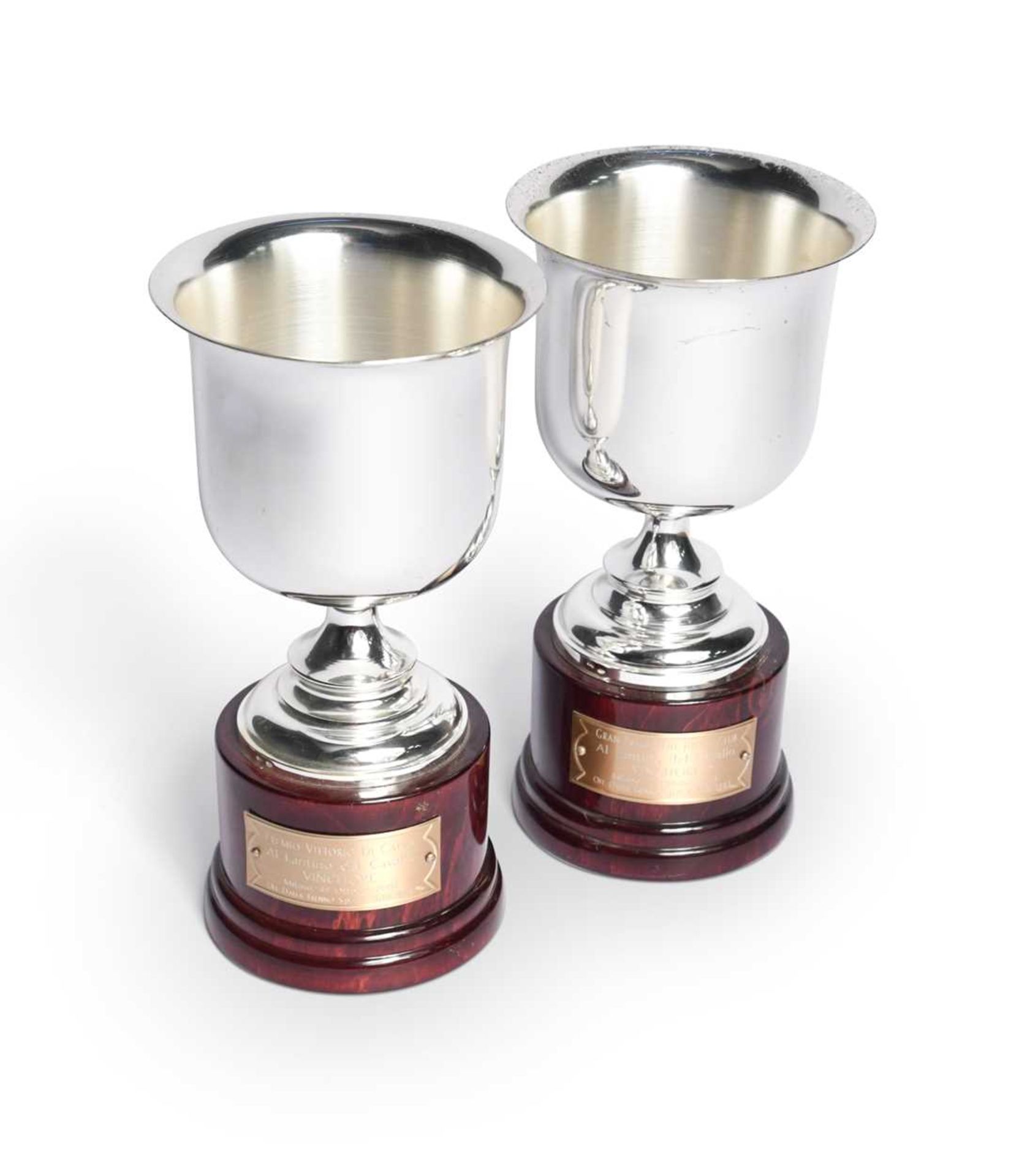 Two Gran Premio del Jockey Club silver trophy cups, awarded to Frankie Dettori,