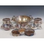 A collection of silver plated coasters and dishes with stags heads