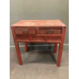 A Chinese red painted table with two frieze drawers and brass mounts, 89 x 89.5 x 56cm