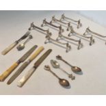 8 pairs of French silver plated knife rests, mark of Christofle, together with a pair of silver