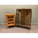 A Deco walnut and stained wood display cabinet on cabriole legs 126 x 92 x 31cm, and an oak