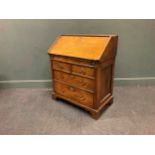 An 18th century and later oak bureau 94 x 78 x 45cm