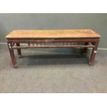 A Chinese red-painted hardwood bench, 55 x 138 x 39cm