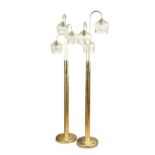 A pair of brass three-branch tulip floor lamps, circa 1980,